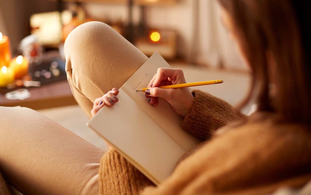 Woman relaxing and journaling